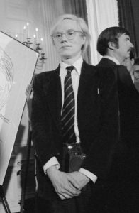 Andy Warhol photographed in 1977, a central figure of Pop Art