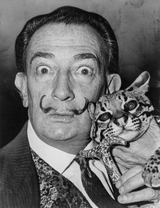 Portrait photograph of Salvador Dalí, a leading Surrealist painter