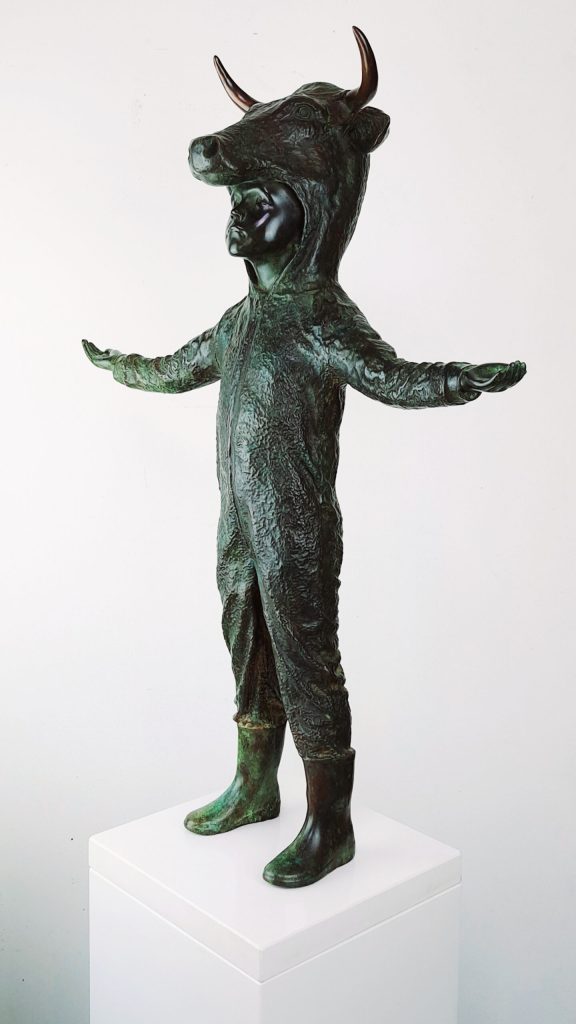 Hannes Verhoeven, "Here Comes the Rain," bronze, 75 cm — child in a bull costume, arms spread wide, bronze edition