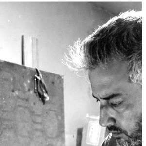 Portrait of Hossein Kaveh (KAVEH) in his studio