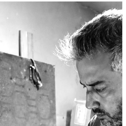 Portrait of Hossein Kaveh (KAVEH) in his studio